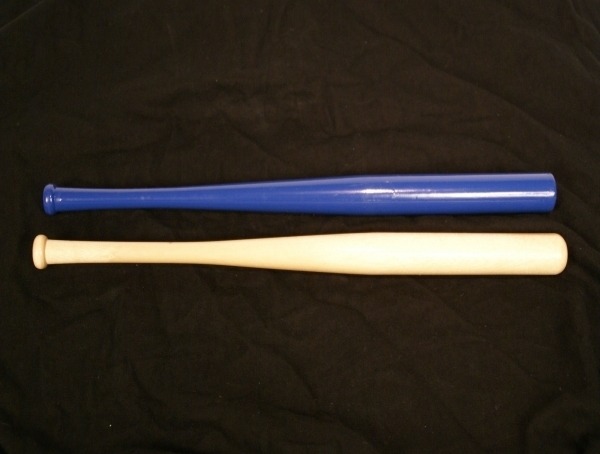 Two custom wood baseball bats showcasing different sizes and finishes, including painted and unfinished options.